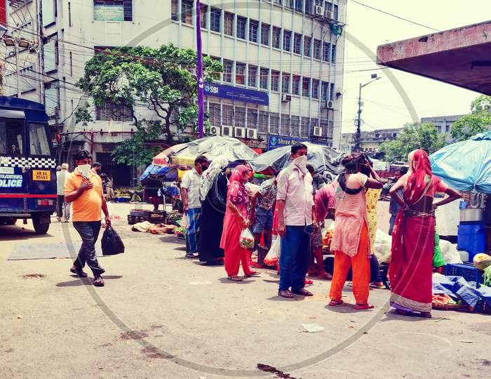 Masked People are buying vegetables and meats in Kolkata, West Bengal, India during Unlock 2.0 on 28th June 2020