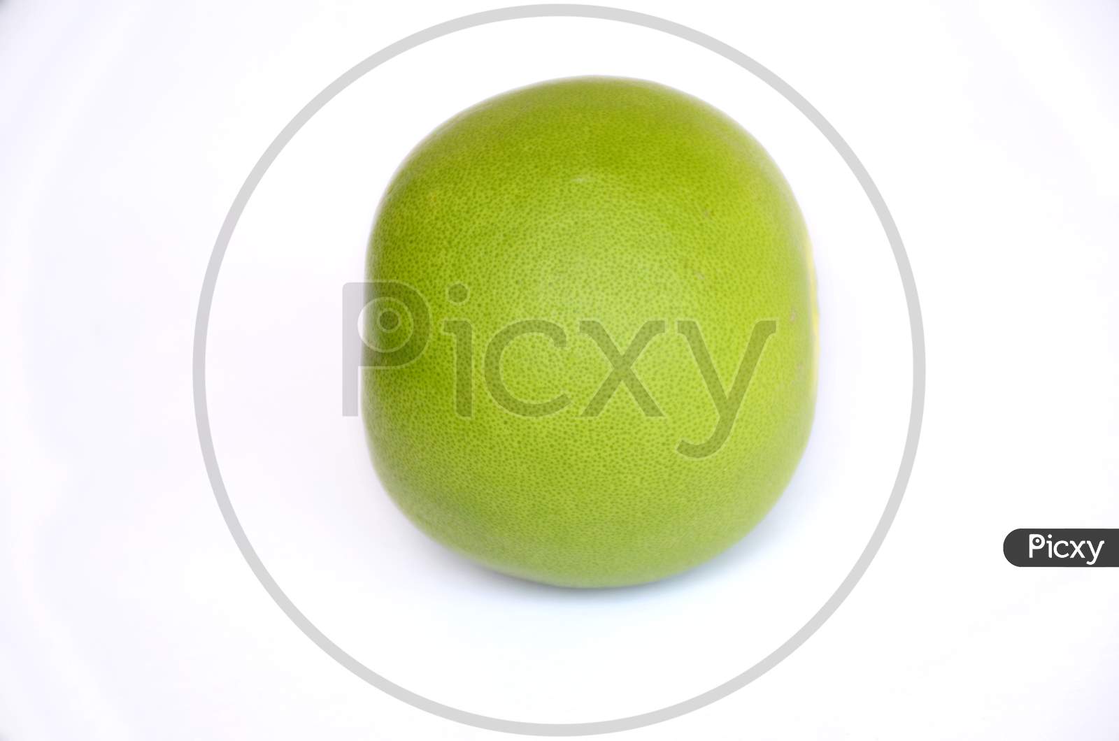 the ripe green lime fruit isolated on white background.