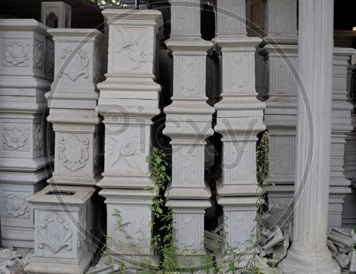 Decorative ornaments are usually applied to poles in an architectural building