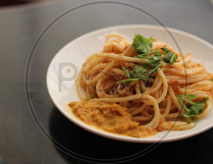 Classic Tomato spaghetti with coriander on top