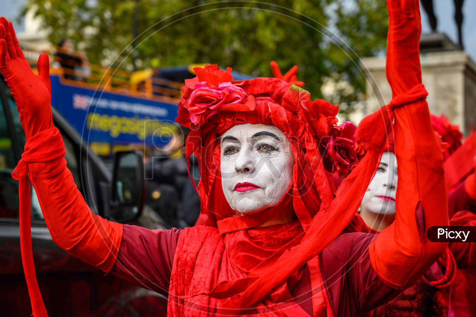 Close Up Of Red Brigade Protesters At An Extinction Rebellion Protest