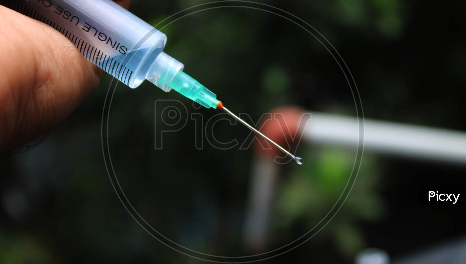 Syringe with virus medicine bottle