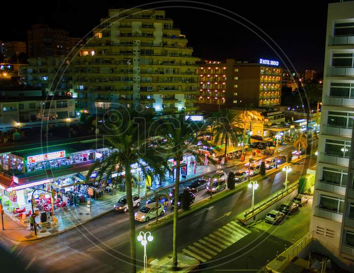 Malaga, Spain - September 02, 2015: A Night View Of City Architecture And Market Located In Costa Del Sol Occidental Is A Comarca In Andalusia, Southern Spain