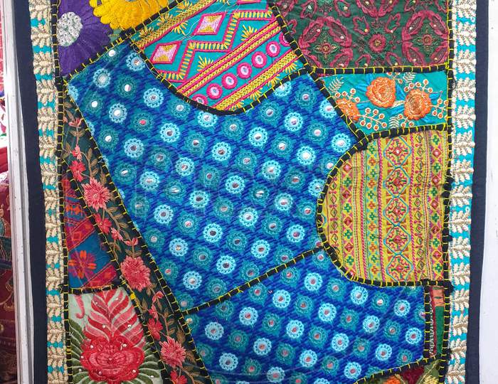 Mandi, Himachal Pradesh / India - 03 07 2020: Photo of a beautifully designed Rajasthani artwork mattress for sale in the market