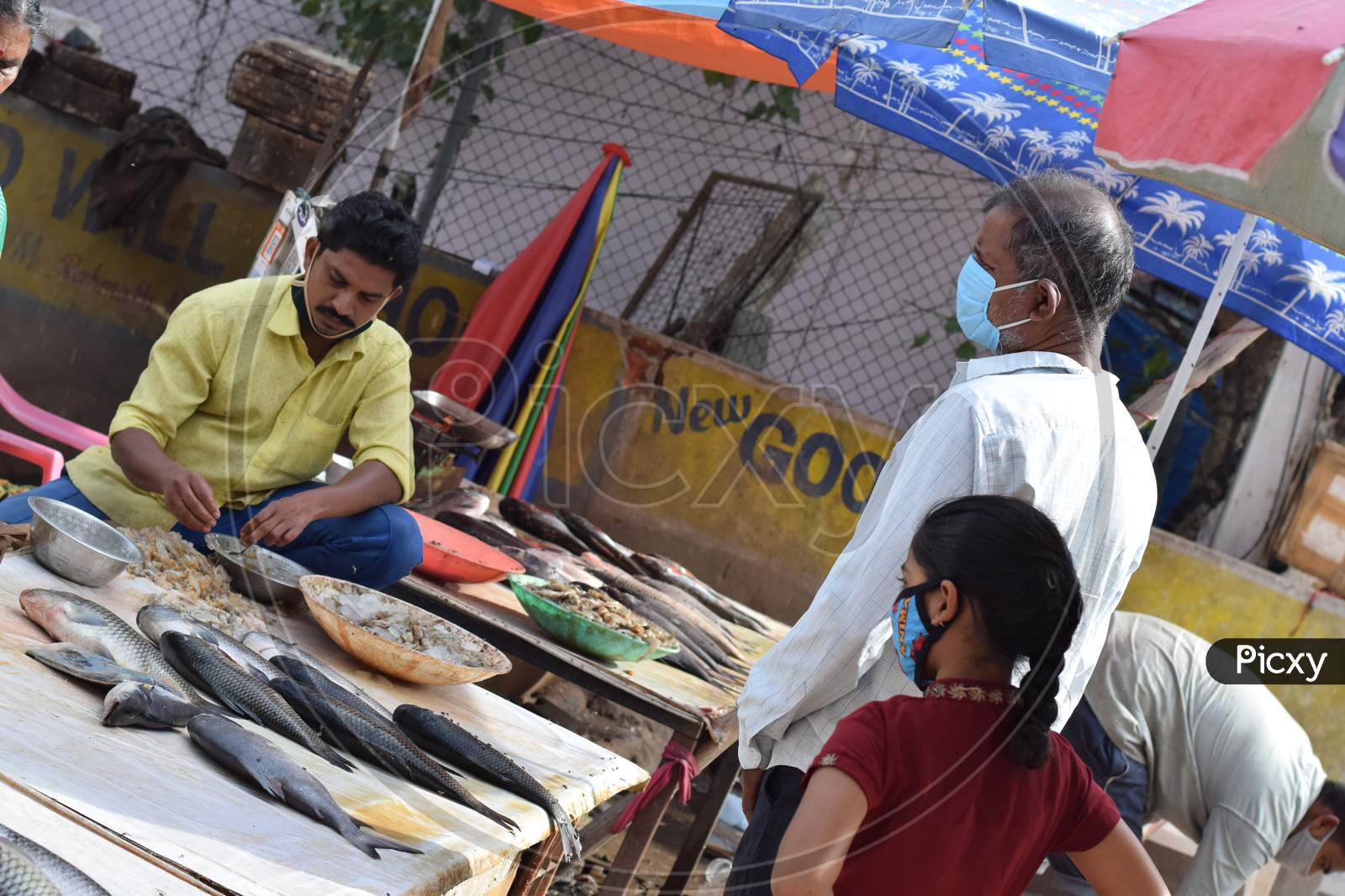 Hyderabad, Telangana, India. July-20-2020: Peoples Wearing At Fish Market, Customer Buying Fish While Wearing Protective Mask, Corona Pandemic Concept