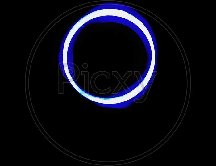 Blue Ring Light With Black Background.