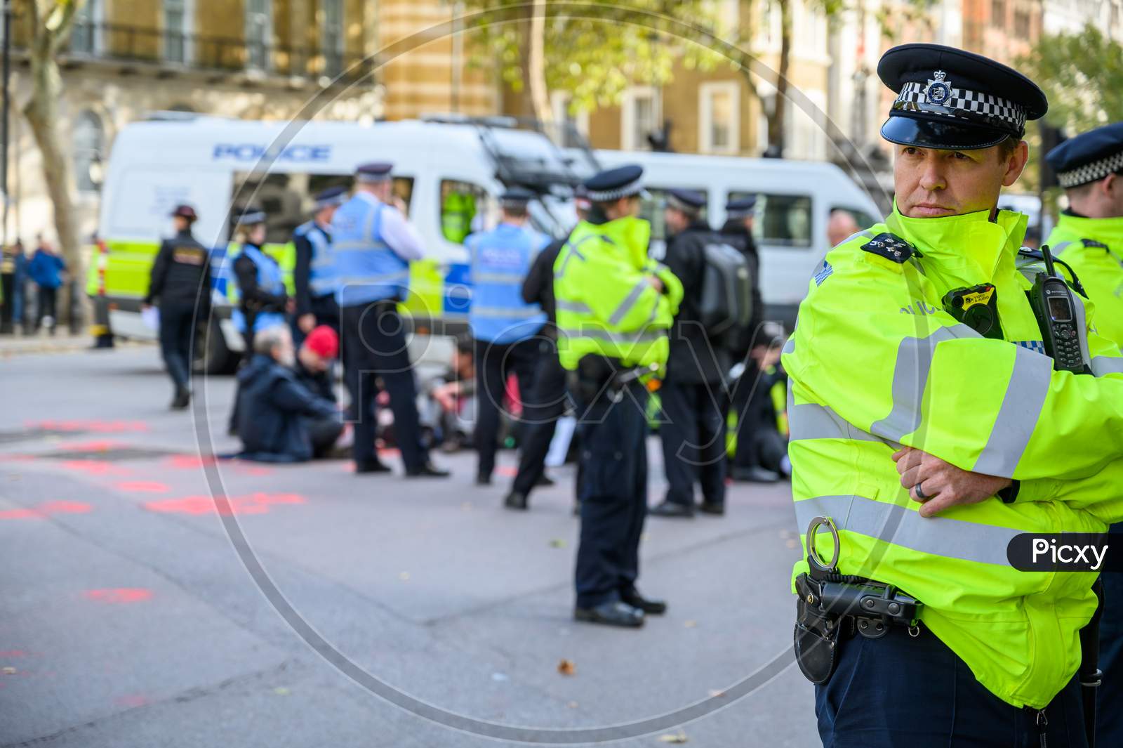 A Metropolitan Police Officer Stands Guard At An Extinction Rebellion Protest
