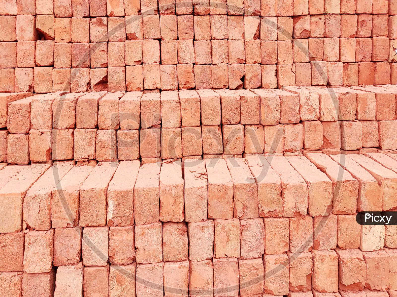Bricks Arranged In Row For House Construction
