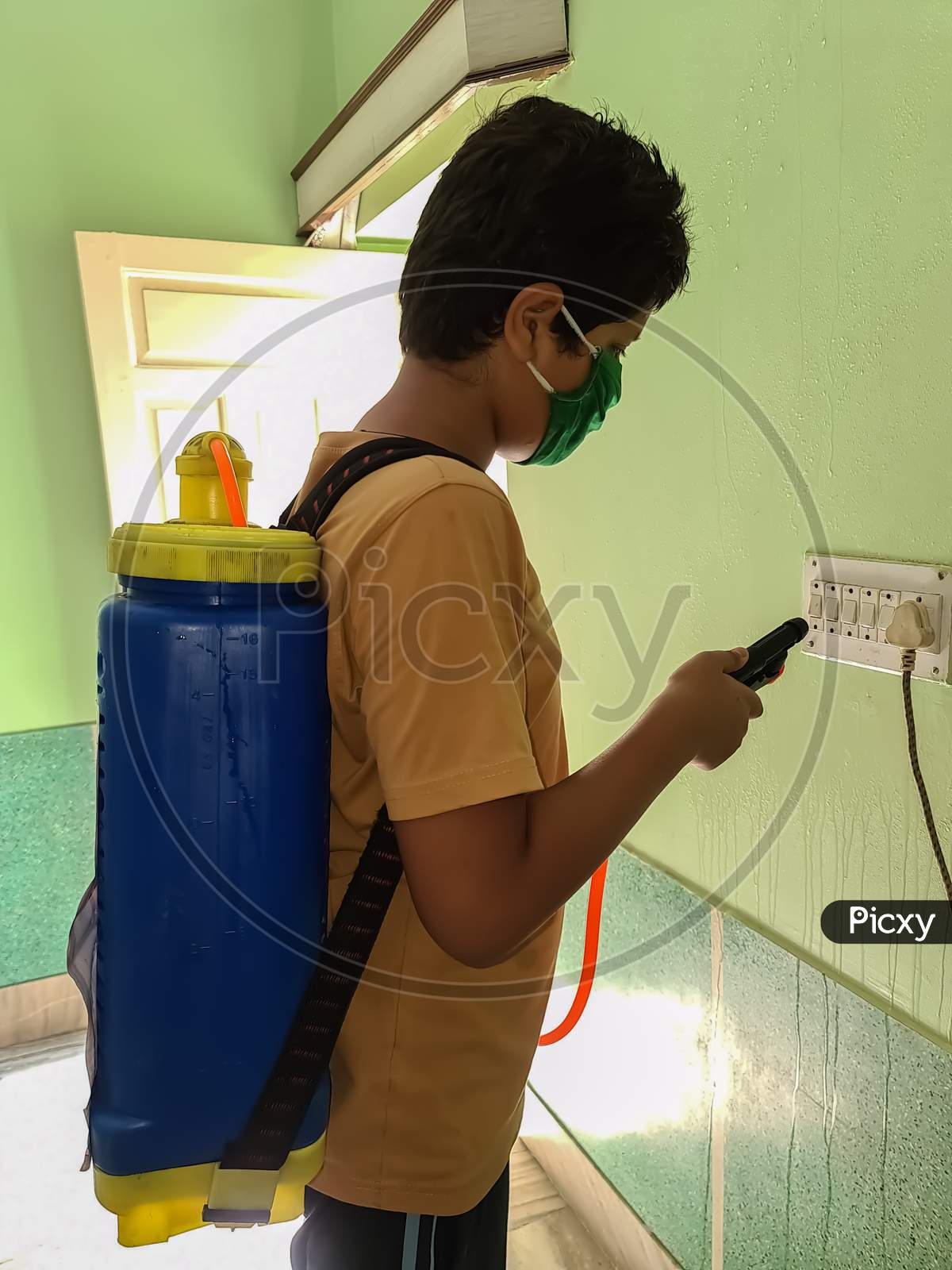 A boy with sanitizer
