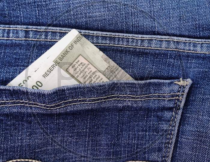 Rupee Bank note kept in jeans pocket closeup view, Selective Focus with space for text