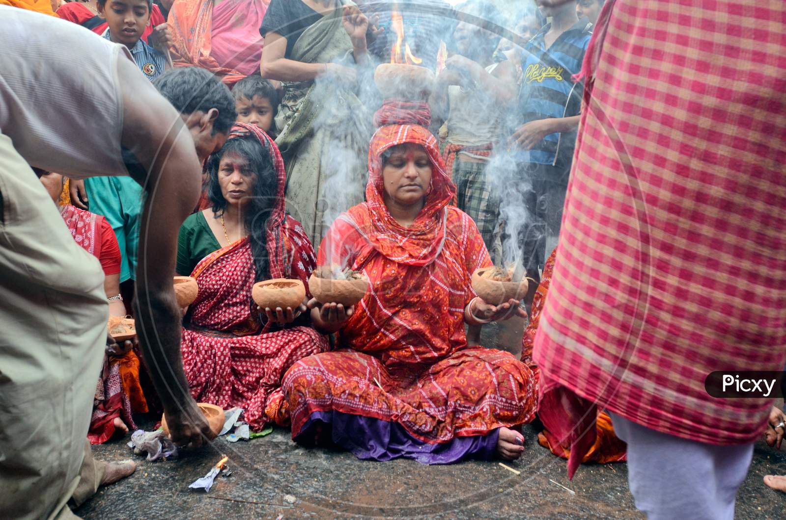 woman devotee praying at shitala pujo