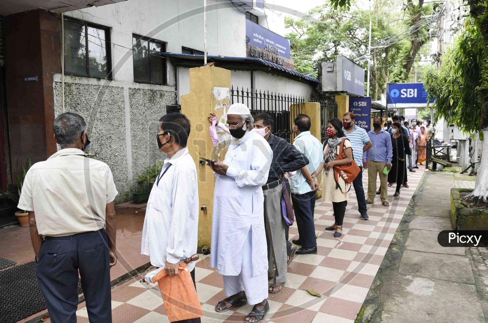 People in queue to enter Bank