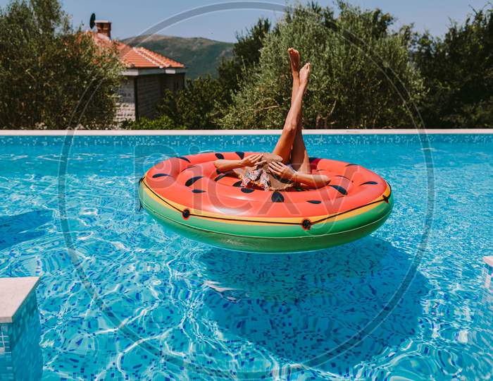 Sexy Woman Relax In Swimming Pool On Inflatable Fun Beach Floaty Outdoors