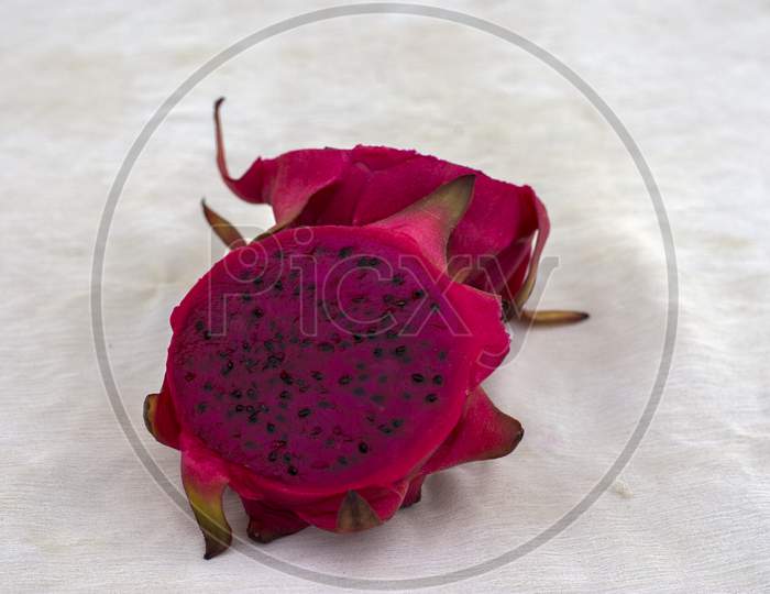 Beautiful Red Dragon Fruit In White Background