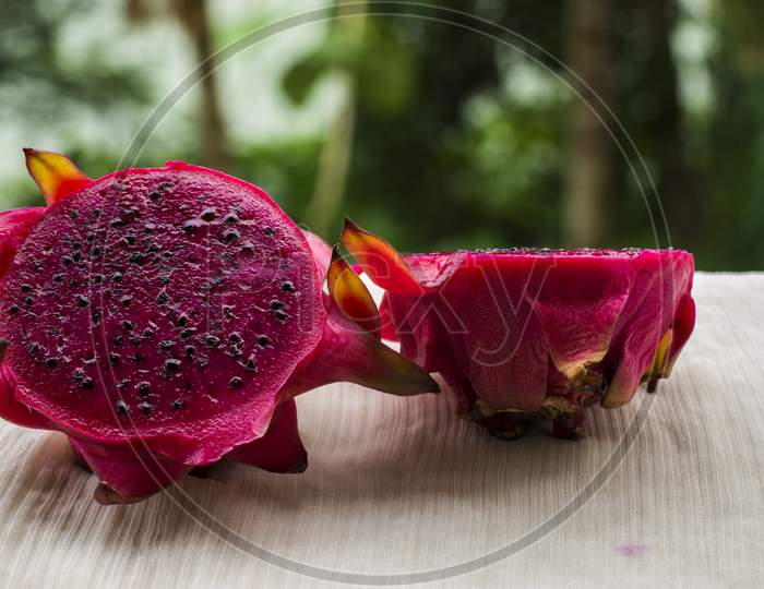 Beautiful Red Dragon Fruit In Natural Background