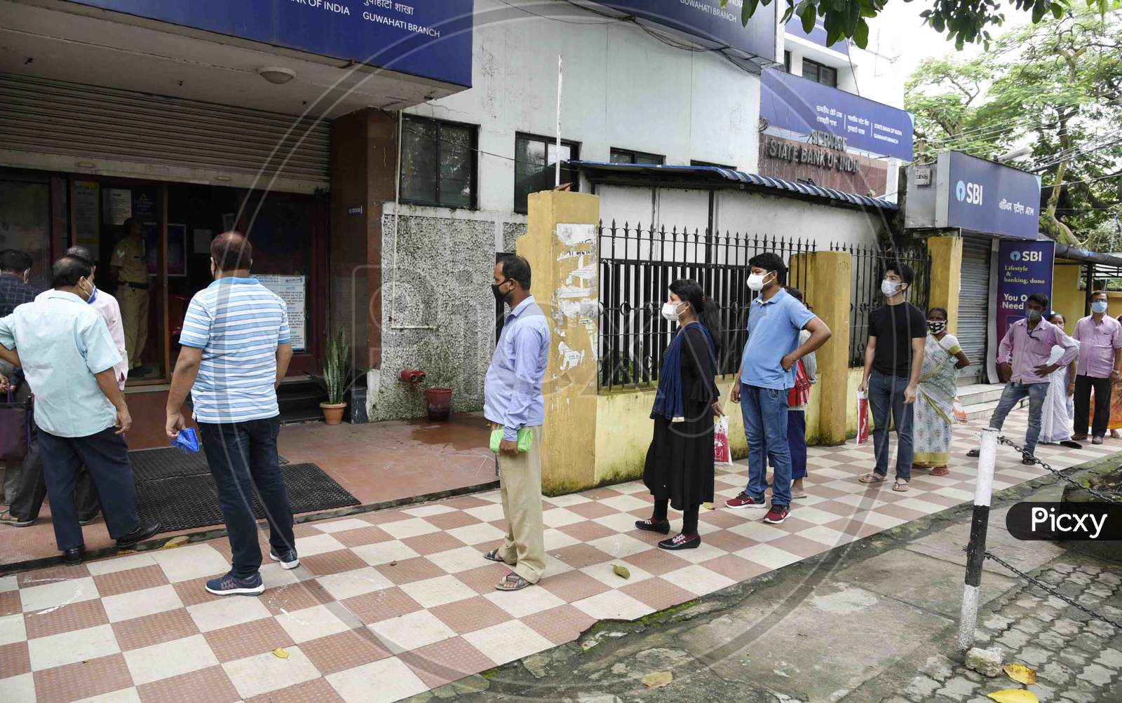 People in queue to enter Bank