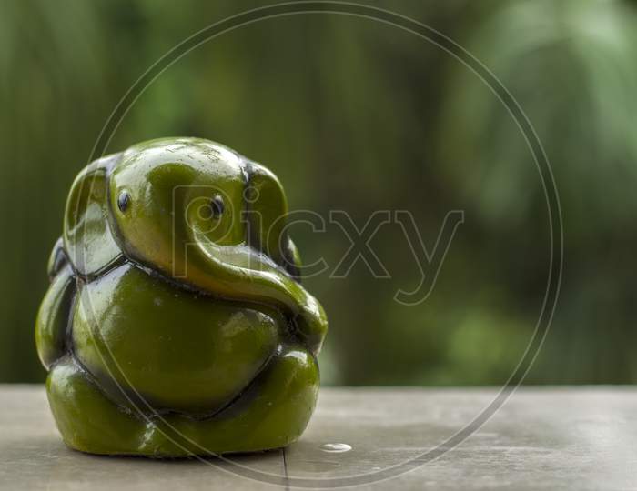 Beautiful Green Lord Ganesha Statue With Natural Background