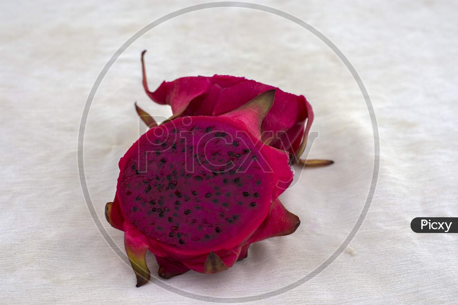 Beautiful Red Dragon Fruit In White Background