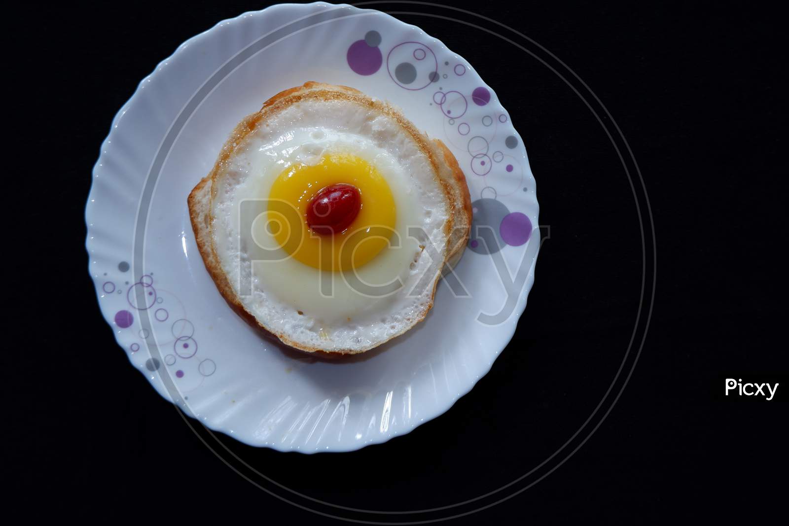 HOME MADE EGG BURGER TOP VIEW ,BLACK BACKGROUND
