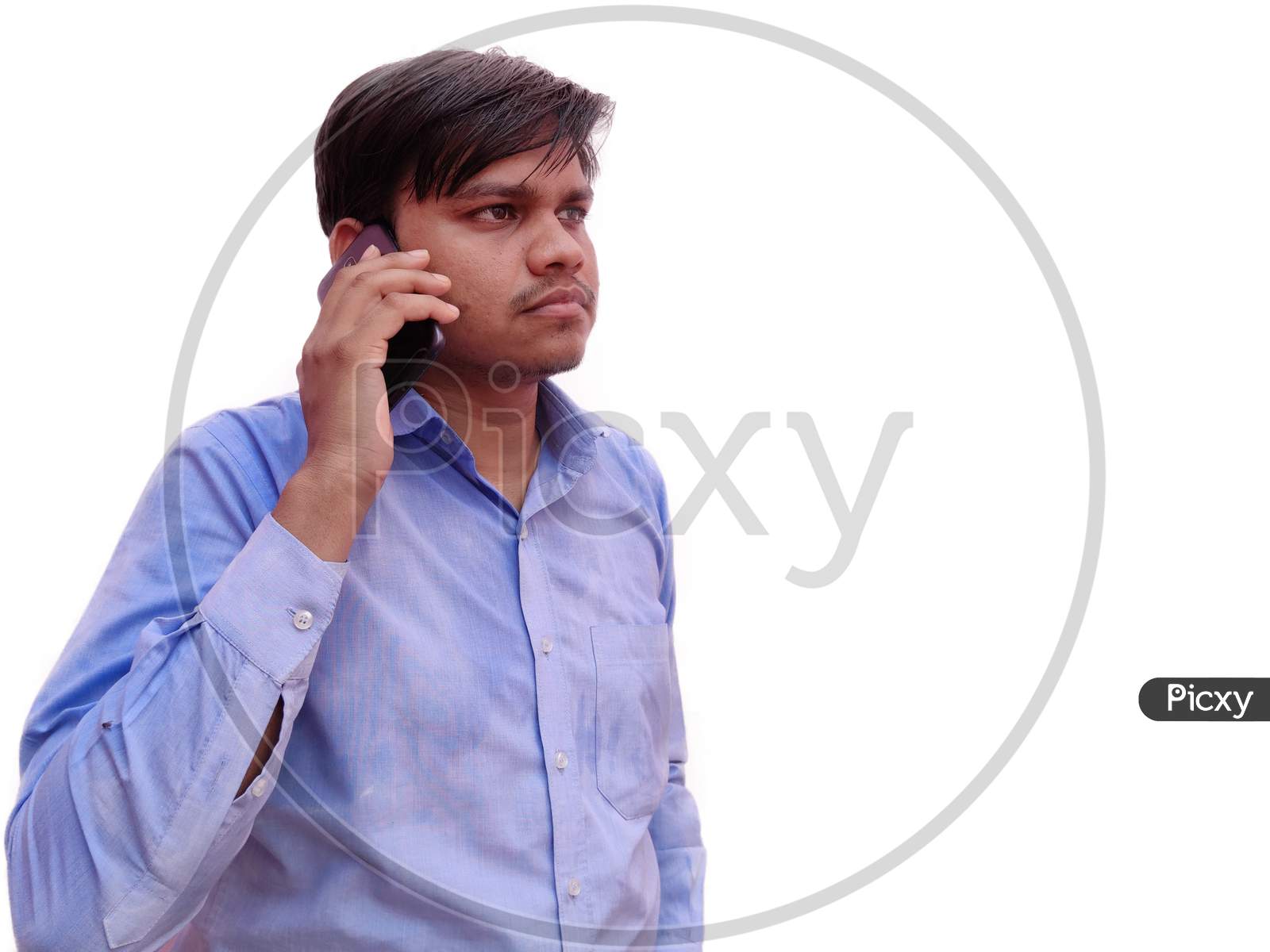 Indian Man talking on phone wearing shirt Isolated on White background
