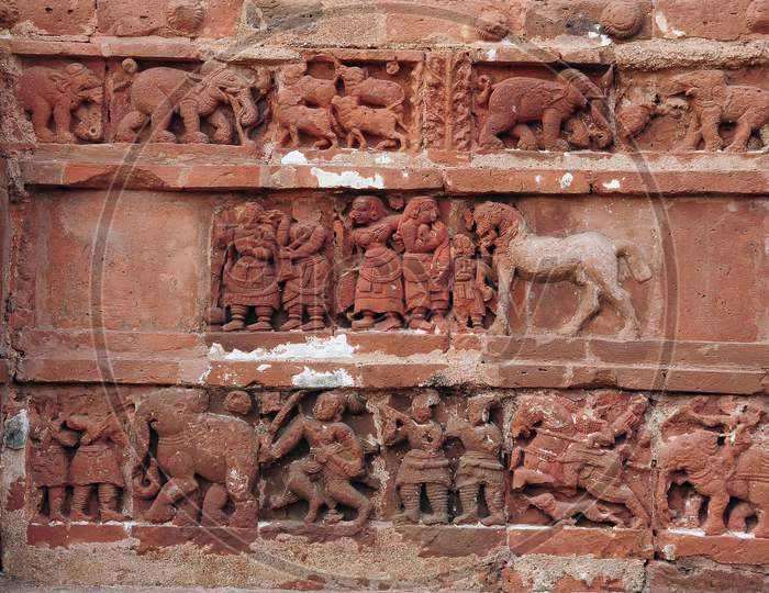 The traditional art work on the temple.