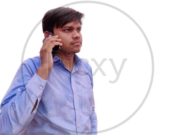 Indian Man talking on phone wearing shirt Isolated on White background