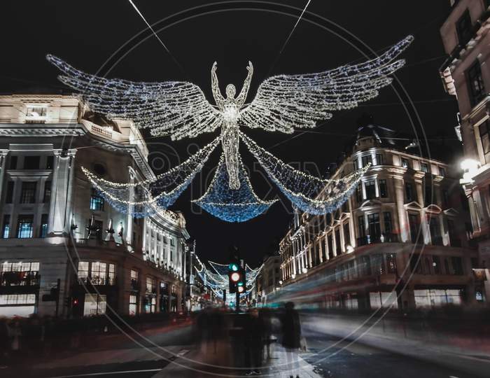 Long exposure shot of Christmas decoration lights on the Oxford street in London.