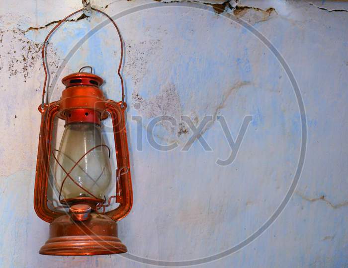 Old oil lamp on the wall, Lantern