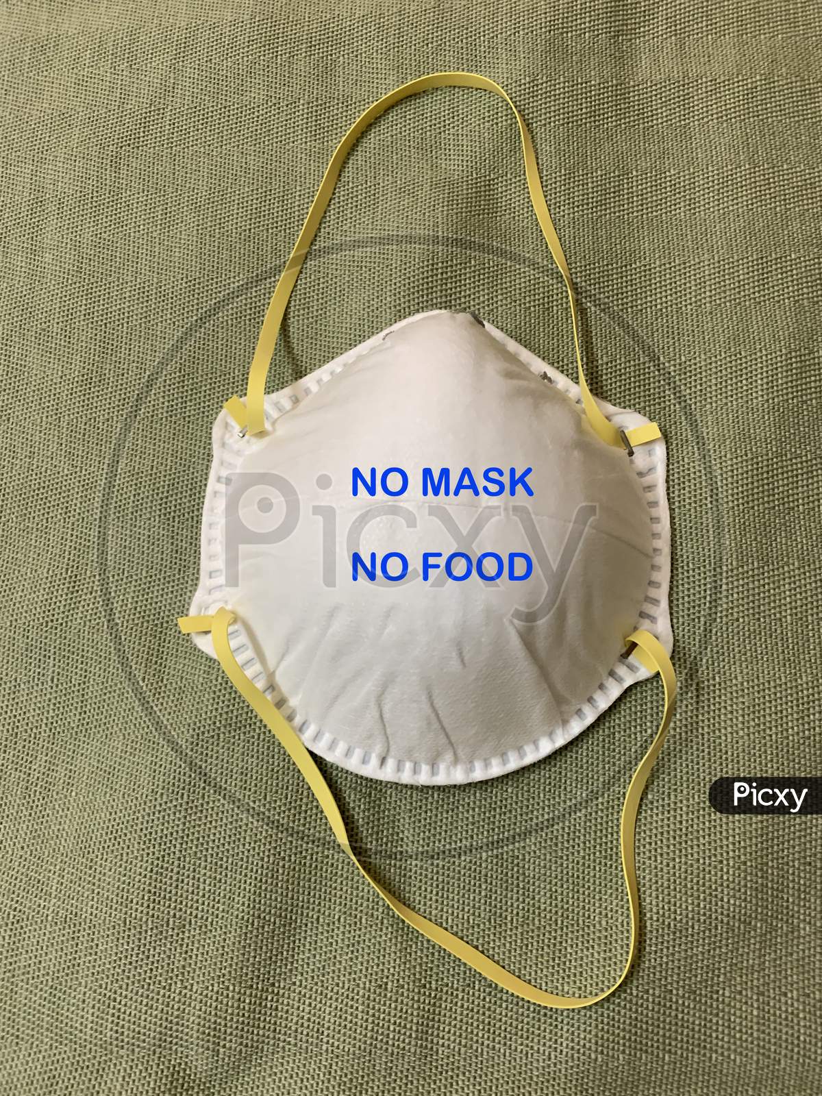 N 95 mask with a message of No mask No food