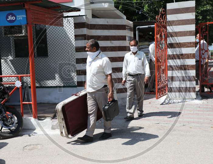 Jammu & Kashmir police personnel carry metal detectors from the Amarnath base camp as the annual pilgrimage got cancelled in the wake of the recent Coronavirus pandemic in Jammu on July 22, 2020