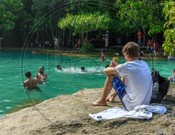 Emerald Crystal Blue Water Pool In Thailand, Citizens And Tourists Swiming