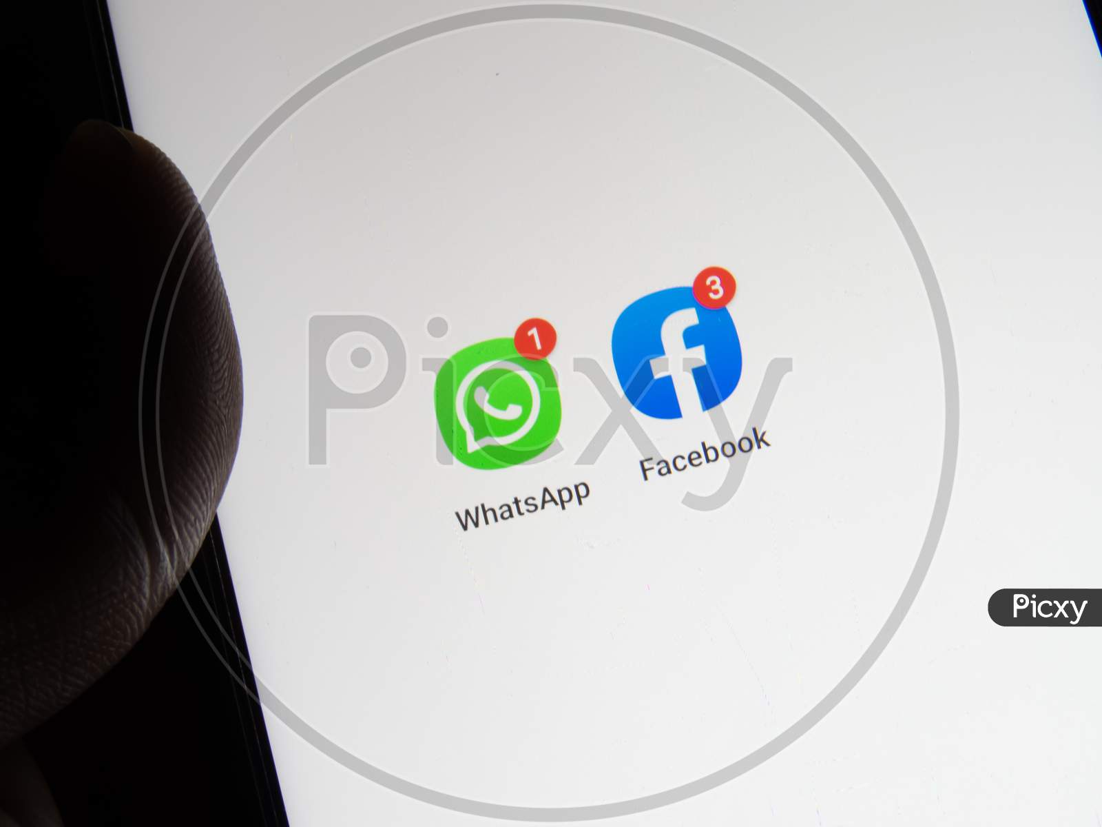 Whatsapp And Facebook Icon In Mobile Phone Together.