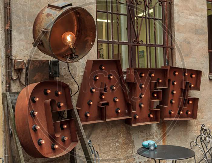 Rusted Color Word Cafe With Lights