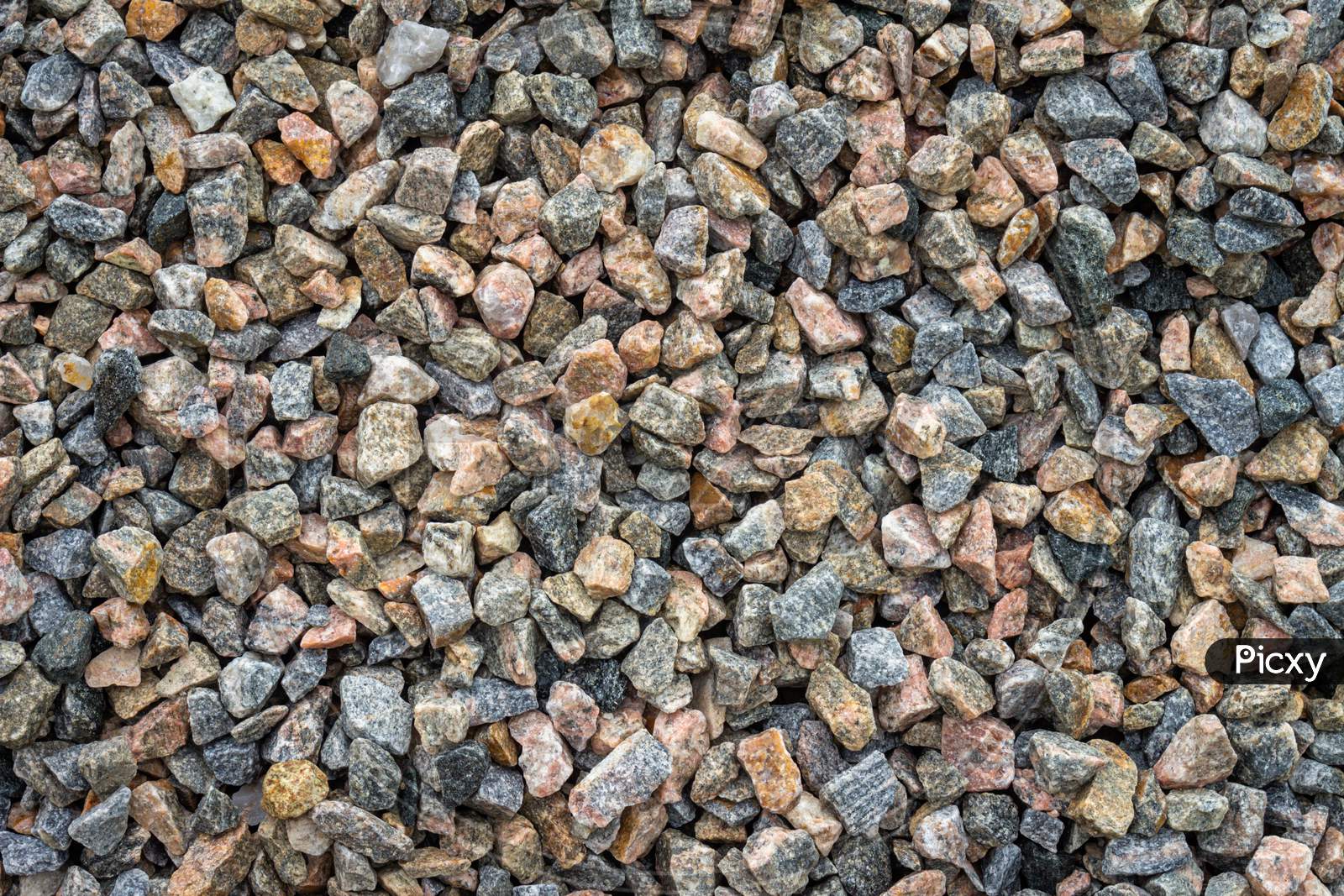 Small Broken Stones Used For Construction. Natural Material For Columns And Bases Of Buildings.