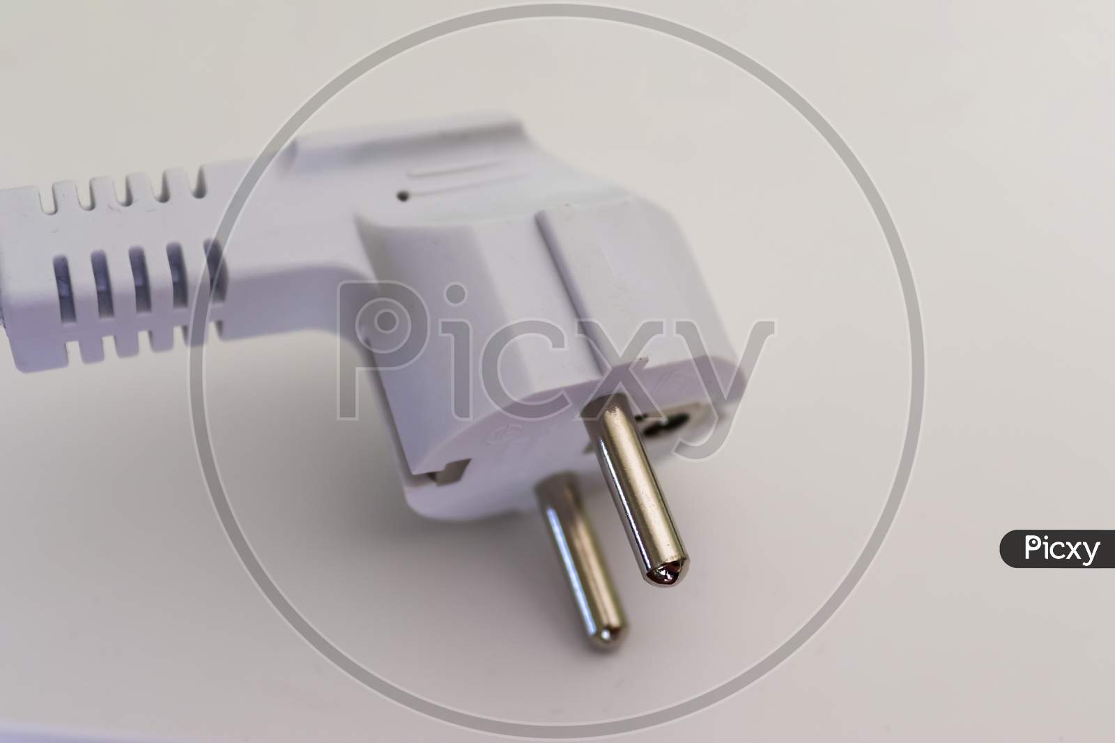 Isolated Electrical Black And White European Plugs On A White Background