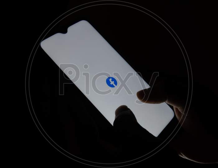 Using Of Facebook App In Mobile Phone.