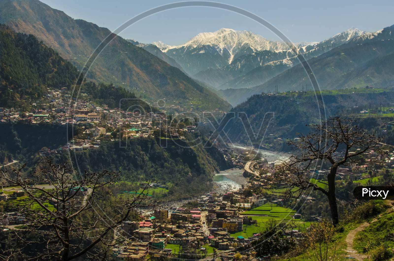 Chamba city view with snow clad Dhauladhar mountain range range in background,Himachal Pradesh.