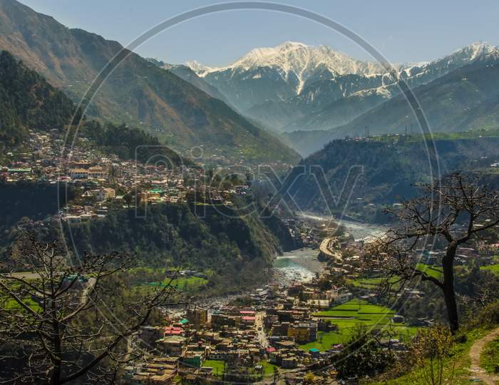 Chamba city view with snow clad Dhauladhar mountain range range in background,Himachal Pradesh.
