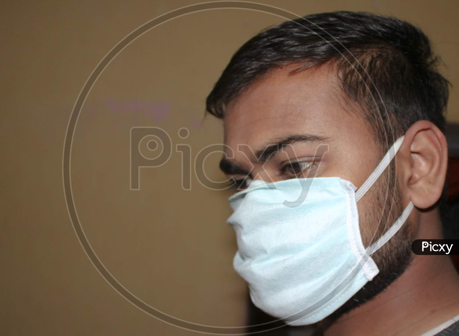 Indian man wearing mask for protection of viruses out