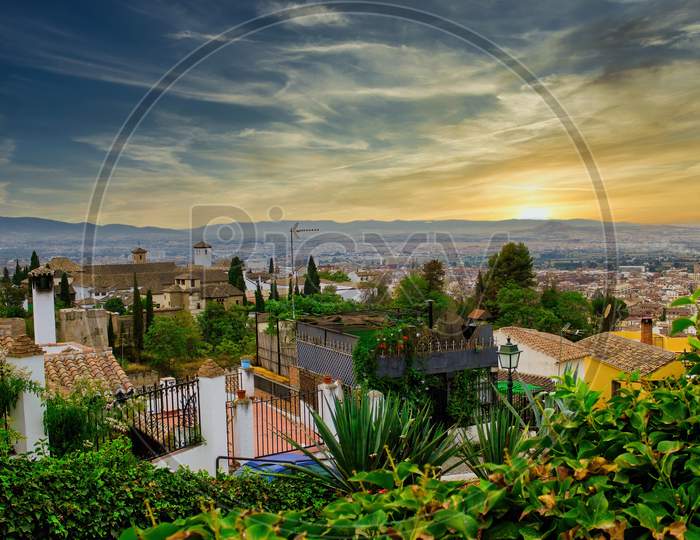Beautiful Scenic View Of Granada City Located In Southern Spain, Andalusia Against Dramatic Sunrise Sunset, Europe
