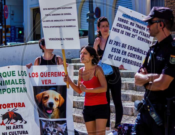 Ronda, Spain - September 06, 2015: A Protest Against Animal Cruelty During Feria Season. Protesters Are Opposing Toro Festival In Andalusia Which Consists Bullfight