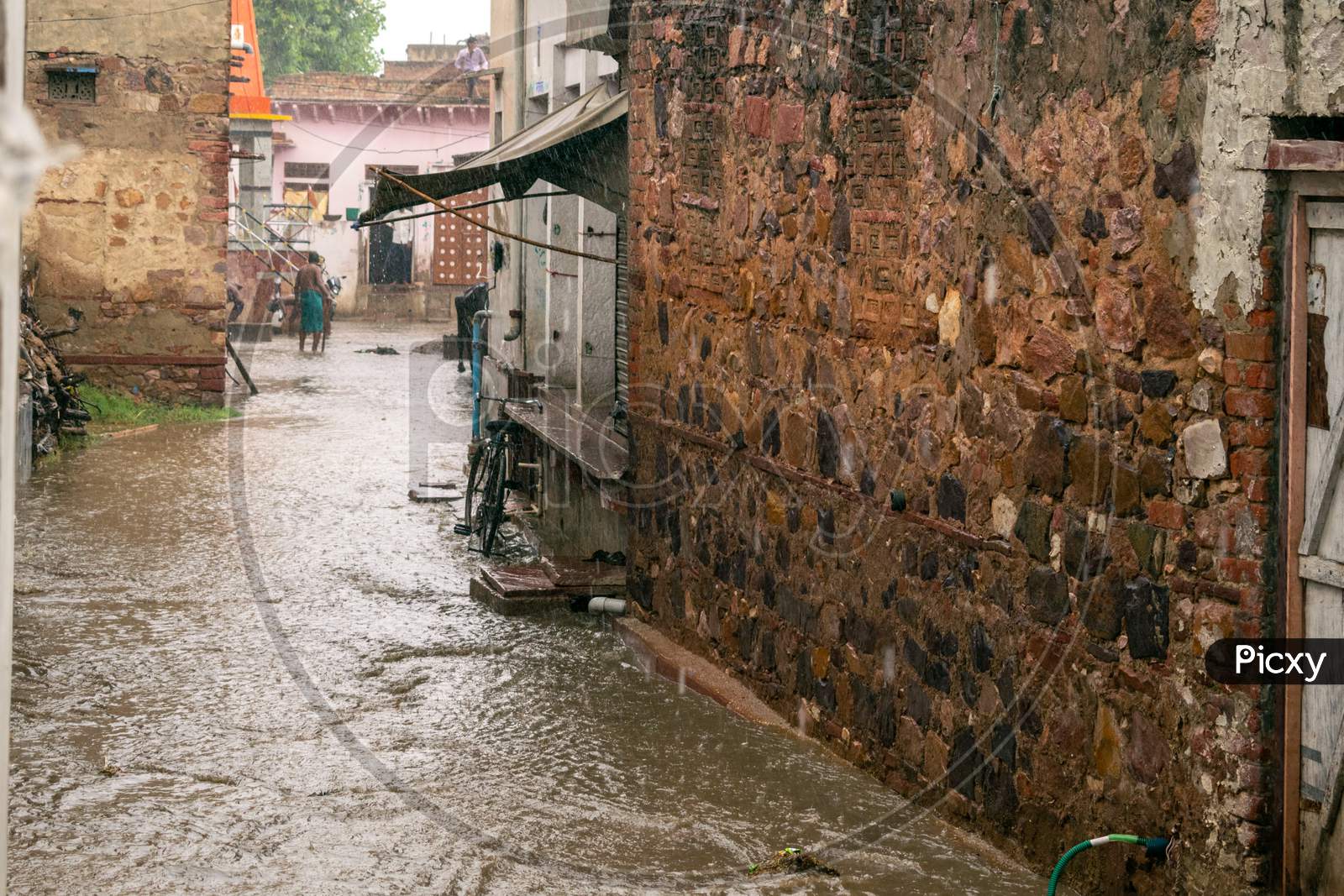 A waterlogged street during a heavy rainfall in monsoon season in Bharatpur