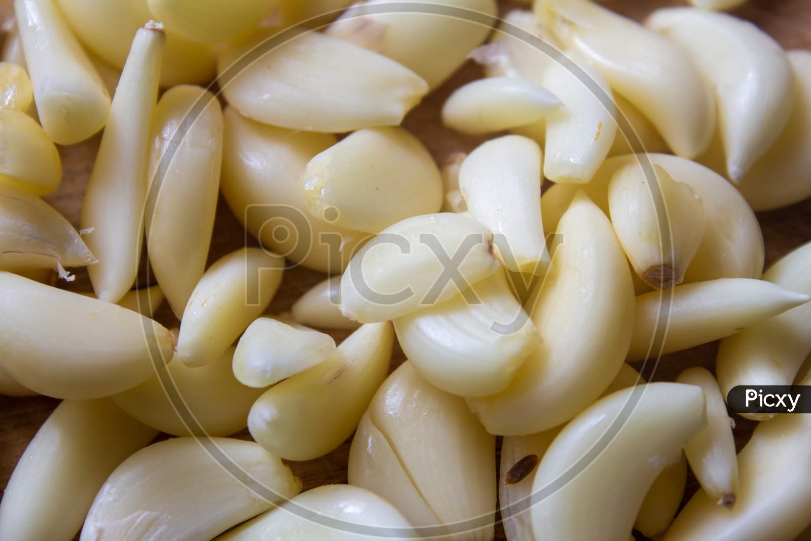 View Of Broken Down Garlic Pieces. Garlic Helps Build Immunity Against Cold And Flu.