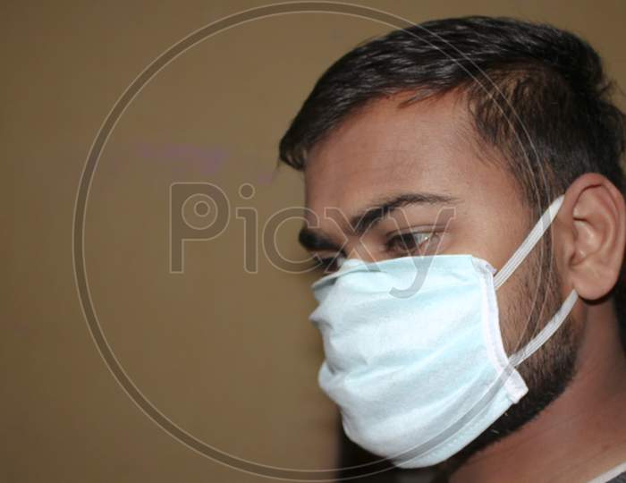 Indian man wearing mask for protection of viruses out