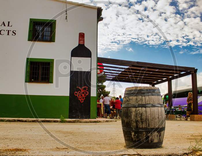 Ronda, Spain - September 06, 2015: A Wooden Beer Barrel In A Restaurant Next To Highway