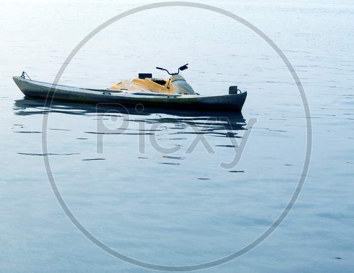 Holiday and travel background with empty water boat floating on water.