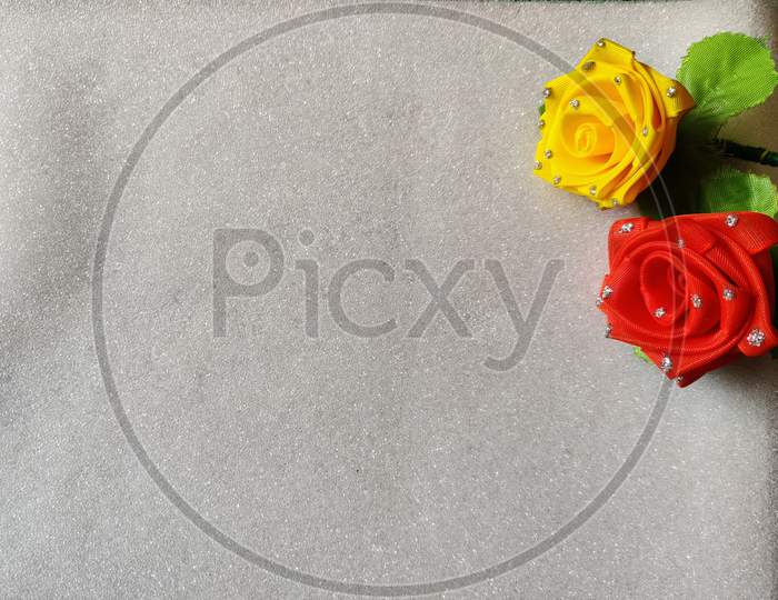 Yellow And Red Rose Are Kept In White Background. Can Be Used For Copy Space, Advertisements.