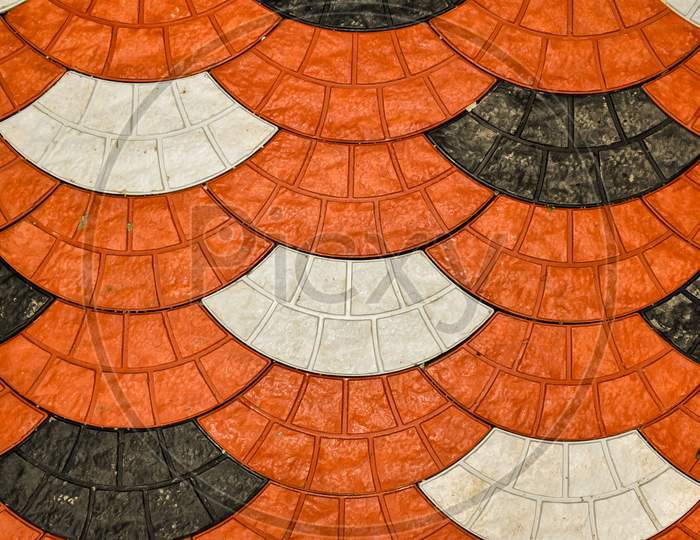 Colorful Patterned Paving Tiles. Interlocking Cement Tiles. Image For Background And Textures.