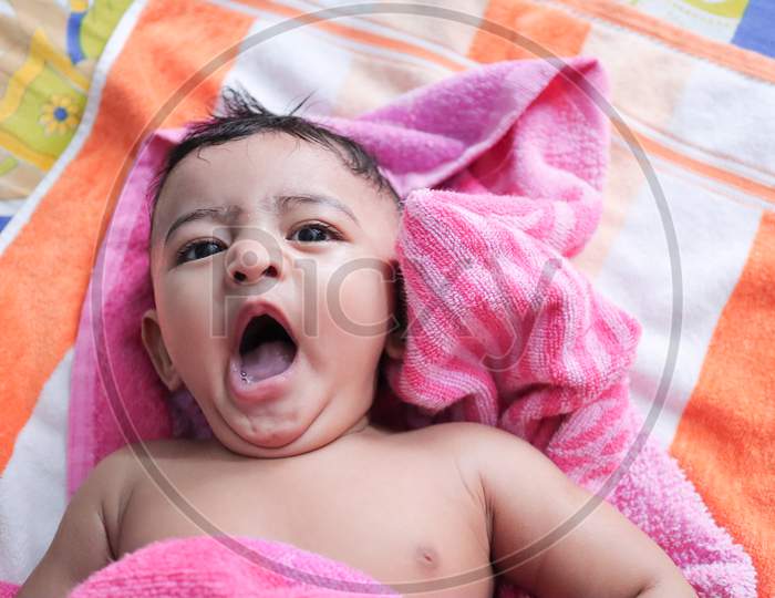 An Infant Toddler Baby Boy Wet With Foam Enjoying Shower Bathing Rubbed By Towel