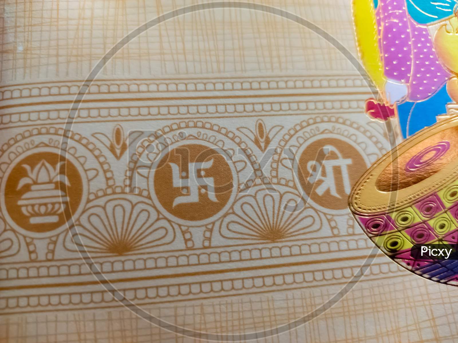 Swastik symbol on Indian traditional wedding invitation card. ohm symbol of Indian traditional.